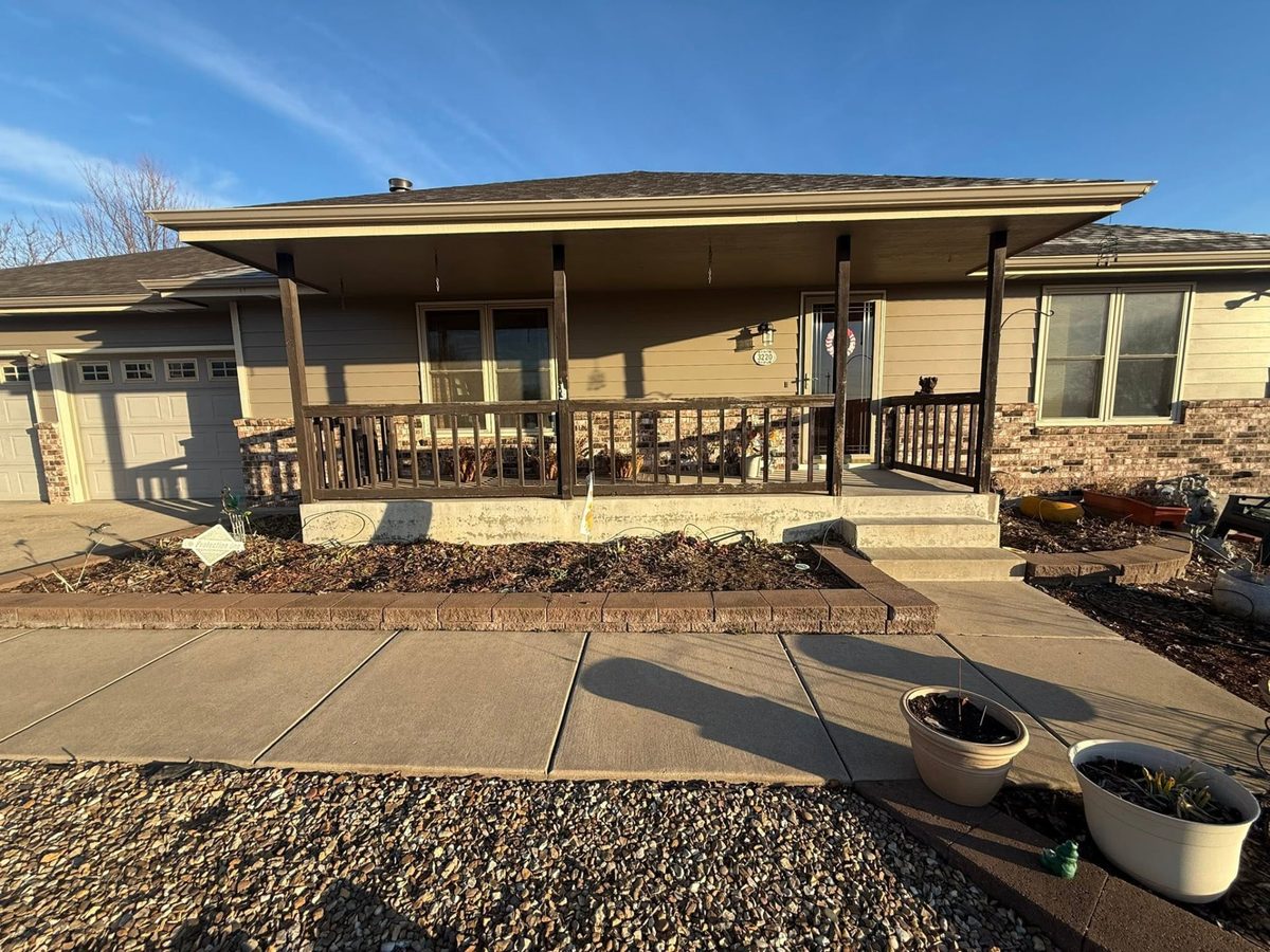 Side view of the front porch before the railing update